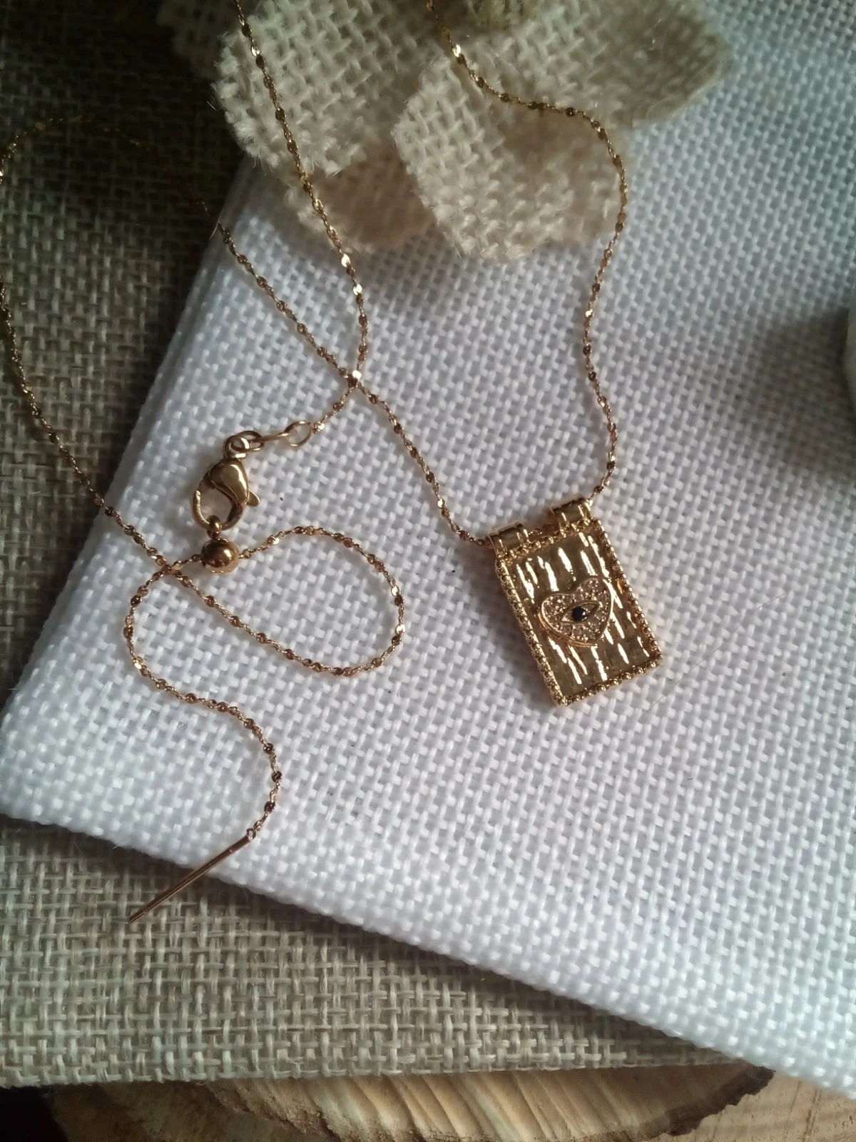 Collier doré coeur  zircons noir et blancs – photo 2